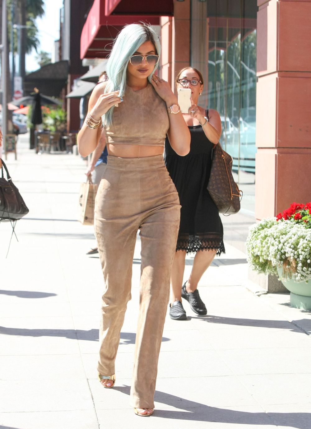 gallery-1436703160-kylie-jenner-wears-matching-suede-trousers-and-top-in-new-york